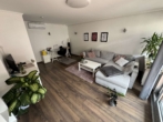 Wohnzimmer - Wunderschöne 3-Zimmerwohnung mit sonnigem Balkon. Auf Wunsch mit TG Stellplatz