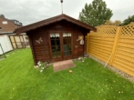 Gartenhaus - Einfamilienhaus mit schönem Garten und Doppelgarage in toller Lage!