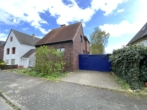 Haus und Garage - Zum Verlieben! Kleines freistehendes Einfamilienhaus mit Gartenparadies in toller Lage!