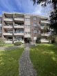 Hausansicht - 3-Zimmer Erdgeschosswohnung mit Balkon und Garage in gepflegtem Haus