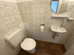 Gäste-WC - 3-Zimmer Erdgeschosswohnung mit Balkon und Garage in gepflegtem Haus