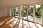 Wohnzimmer - Wunderschöne 3-Zimmer Erdgeschosswohnung mit Terrasse und Garten in Dyklage!