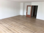 Wohnzimmer - Kernsanierte Wohnung in Citylage! Neues Bad, neuer Boden, neue Wände!