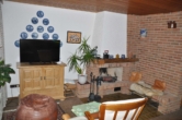 Wohnzimmer - Freistehendes Einfamilienhaus mit tollem Garten in naturnaher Lage!