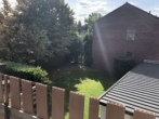 Blick in den Garten - Dyklage: 3-Zimmerwohnung im 1.OG. Garage möglich!