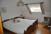 Schlafzimmer - Möblierte 2-Zimmer-Einliegerwohnung zum Wohnen auf Zeit!