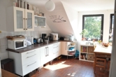 Küche - Traumhafte Maisonettewohnung mit Dachterrasse und Wohnküche.