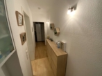Flur - Eigentumswohnung im 1.OG mit Terrasse und Garage in beliebter Lage.
