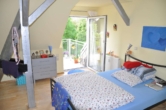 Schlafzimmer - Wunderbare Kapitalanlage: Zuckersüsse 2-Zimmer Dachgeschosswohnung mit sonnigem Balkon und Grünblick