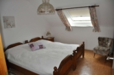 Schlafzimmer - Möblierte 2-Zimmer-Einliegerwohnung zum Wohnen auf Zeit!