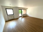 Wohnzimmer - 3-Zimmer Erdgeschosswohnung in der City-Randlage von Krefeld-Hüls