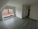 Wohnzimmer - Kleine Maisonettewohnung für eine Einzelperson. Erstbezug nach Renovierung!